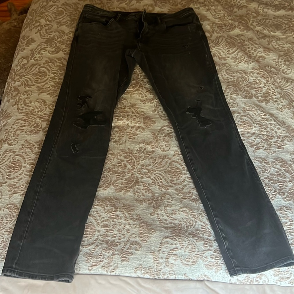 Charcoal Jeans ripped knees. Gently used. American Eagle